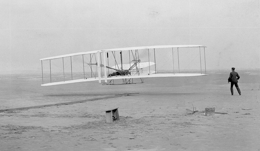 The iconic image of the first powered flight near Kitty Hawk, North Carolina, Dec. 17, 1903. Photo by John T. Daniels.
