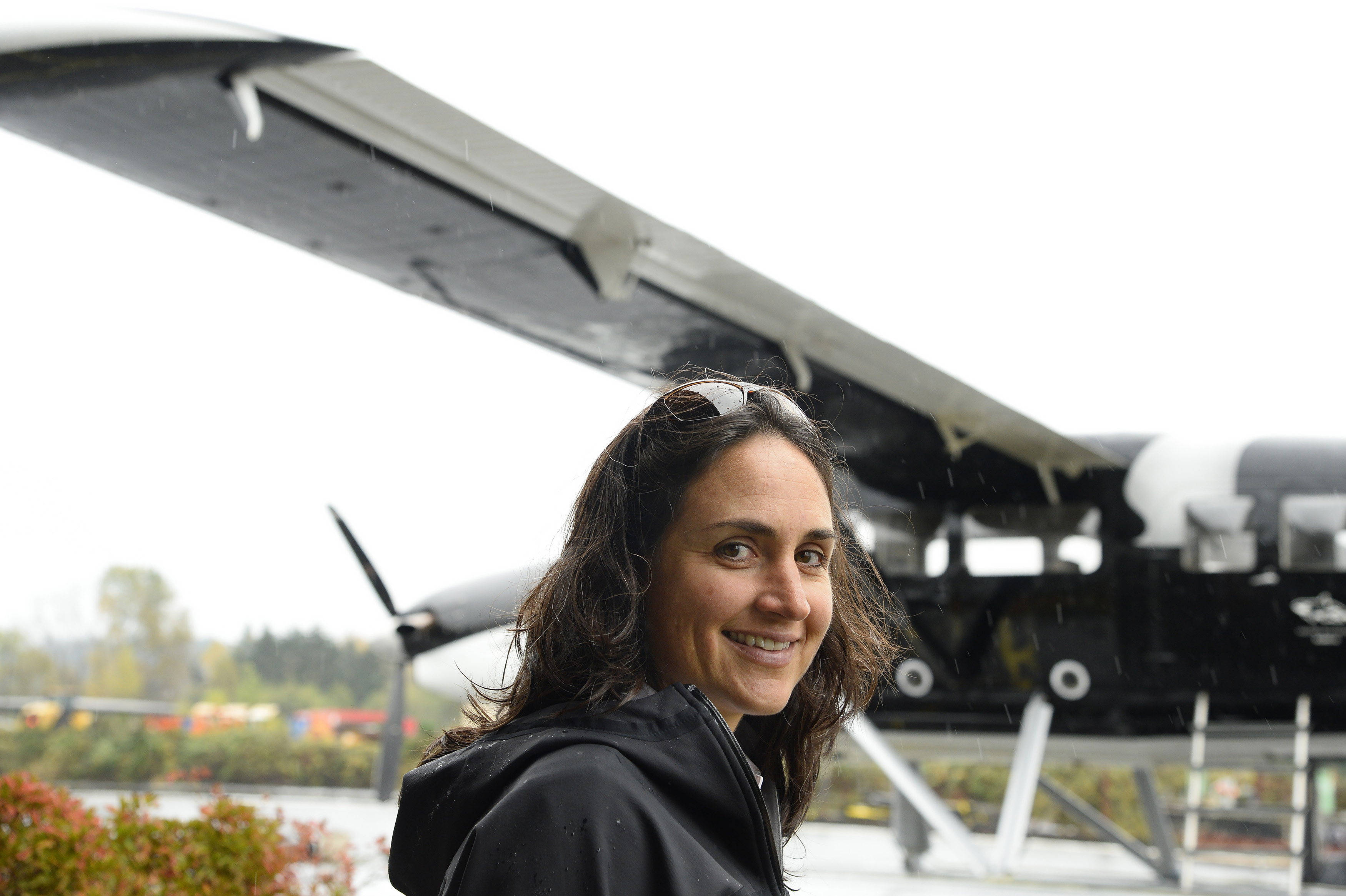 Seaplane pilots Anna Gullickson and Michael Hays (not pictured) are co-founders of WildOrca.org, a non-profit organization that brings awareness to southern resident killer whales and other marine life in Kenmore, Washington. The 'Wild Orca' turbine Otter in the background has an eye-catching black and while paint scheme designed by Hays. Photo by David Tulis.