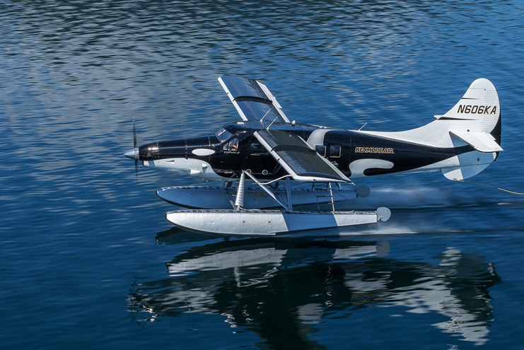 Kenmore Air Harbor's 'Wild Orca' turbine Otter wears an eye-catching black and white paint scheme that seaplane pilots Anna Gullickson and Michael Hays hope can raise awareness for the often misunderstood killer whale. Photo courtesy Chris Teren/WildOrca.org.