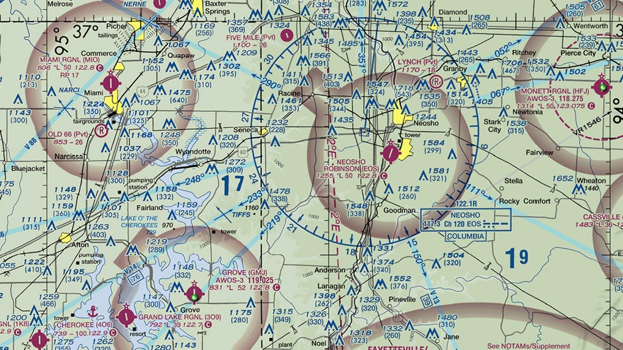 Can you name the two dashed lines (one black and one magenta) running beside Grove Municipal and Five Mile airports? Image courtesy of SkyVector.