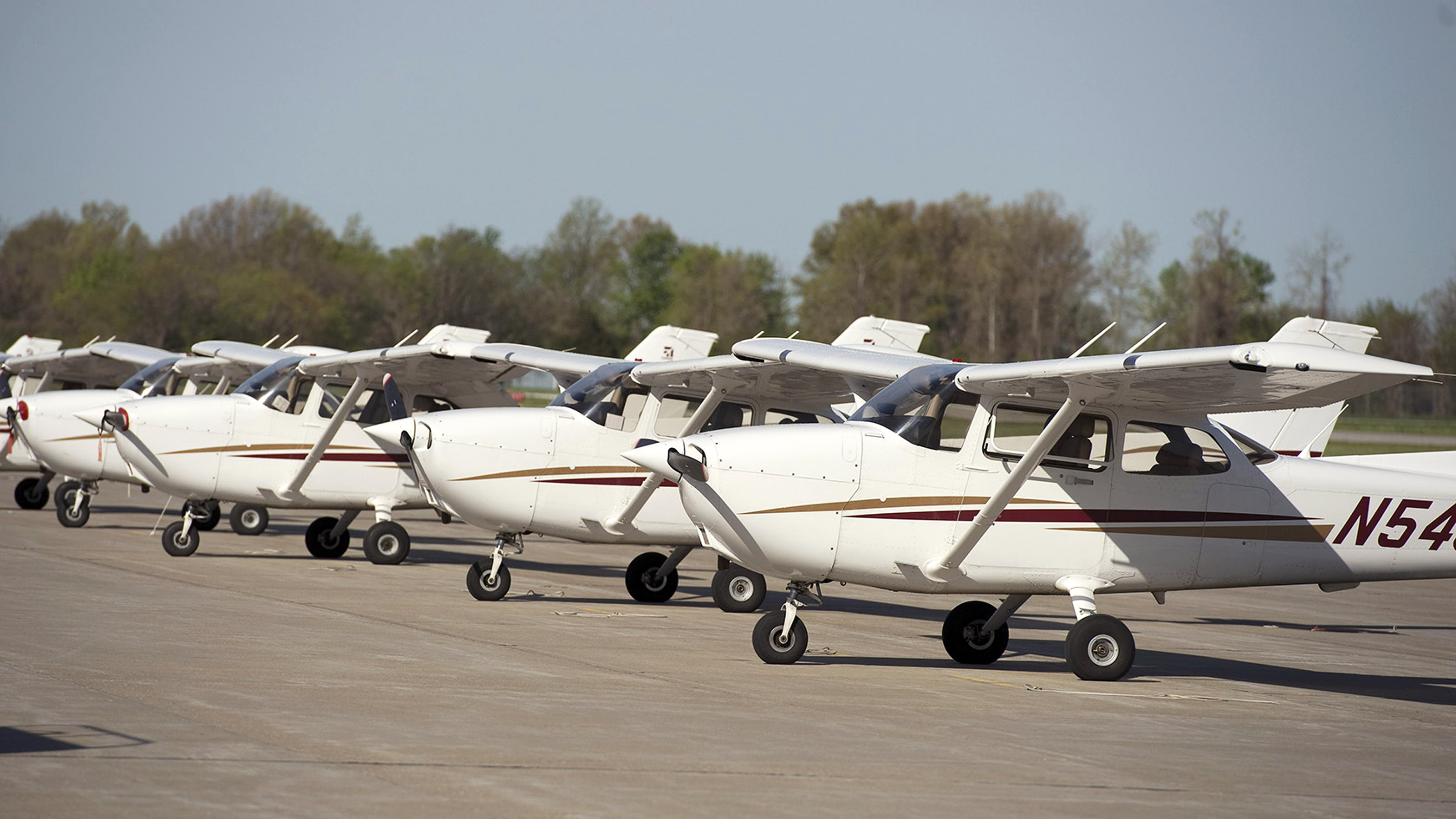 Cessna 172s in the Southern Illinois University Carbondale fleet line the university's ramp at Southern Illinois Airport in Carbondale/Murphysboro, Illinois. Alumni donations are helping to equip the university's fleet with ADS-B hardware in advance of the FAA mandate. Photo courtesy of Southern Illinois University.