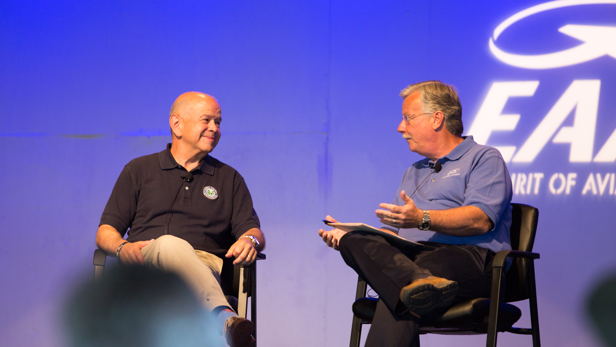 FAA Administrator Michael Huerta chats with EAA CEO Jack Pelton at EAA AirVenture July 27. Jim Moore photo.