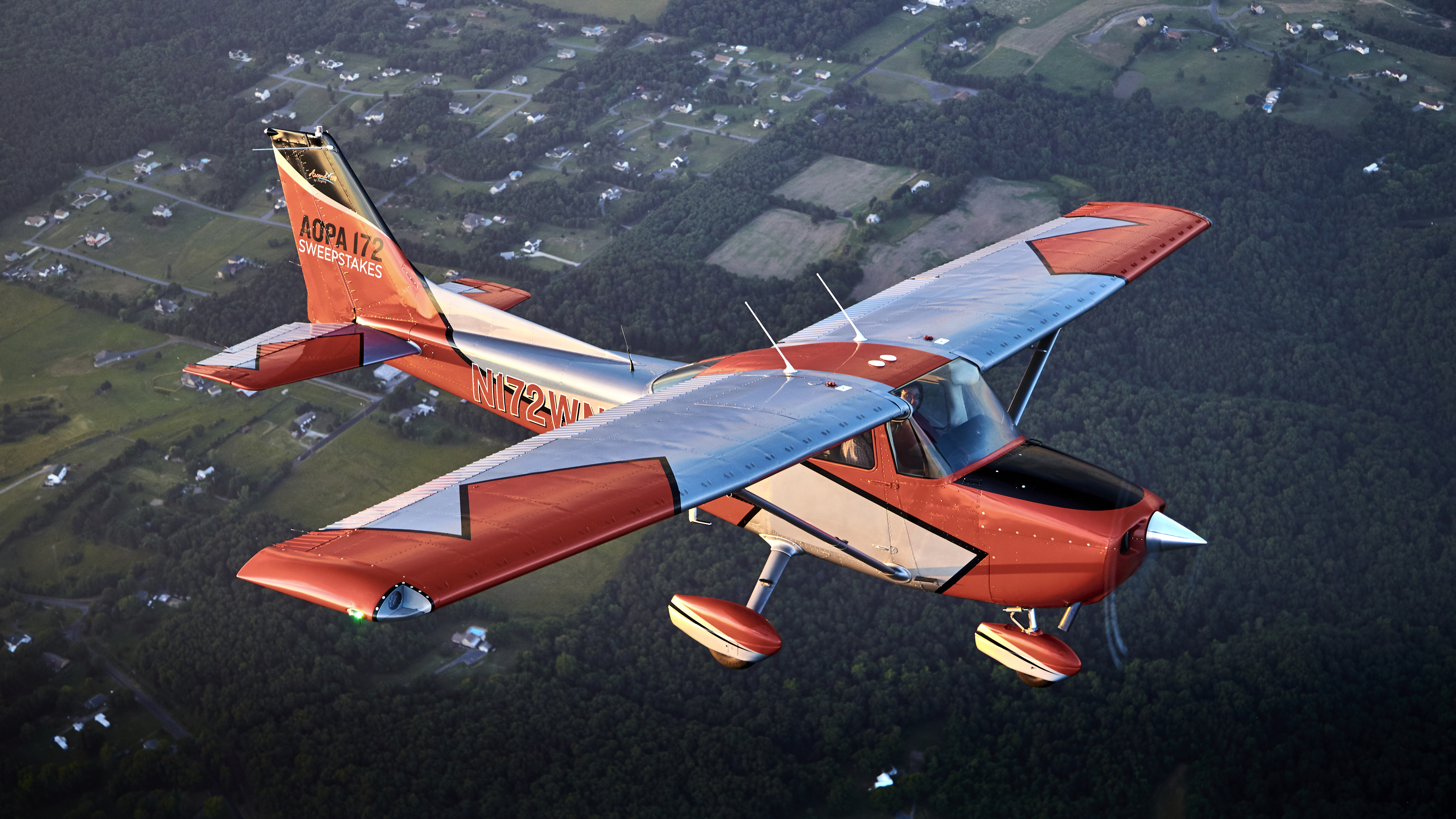 Aerial photography of the AOPA Sweepstakes Cessna 172 Ascend with the new paint job.