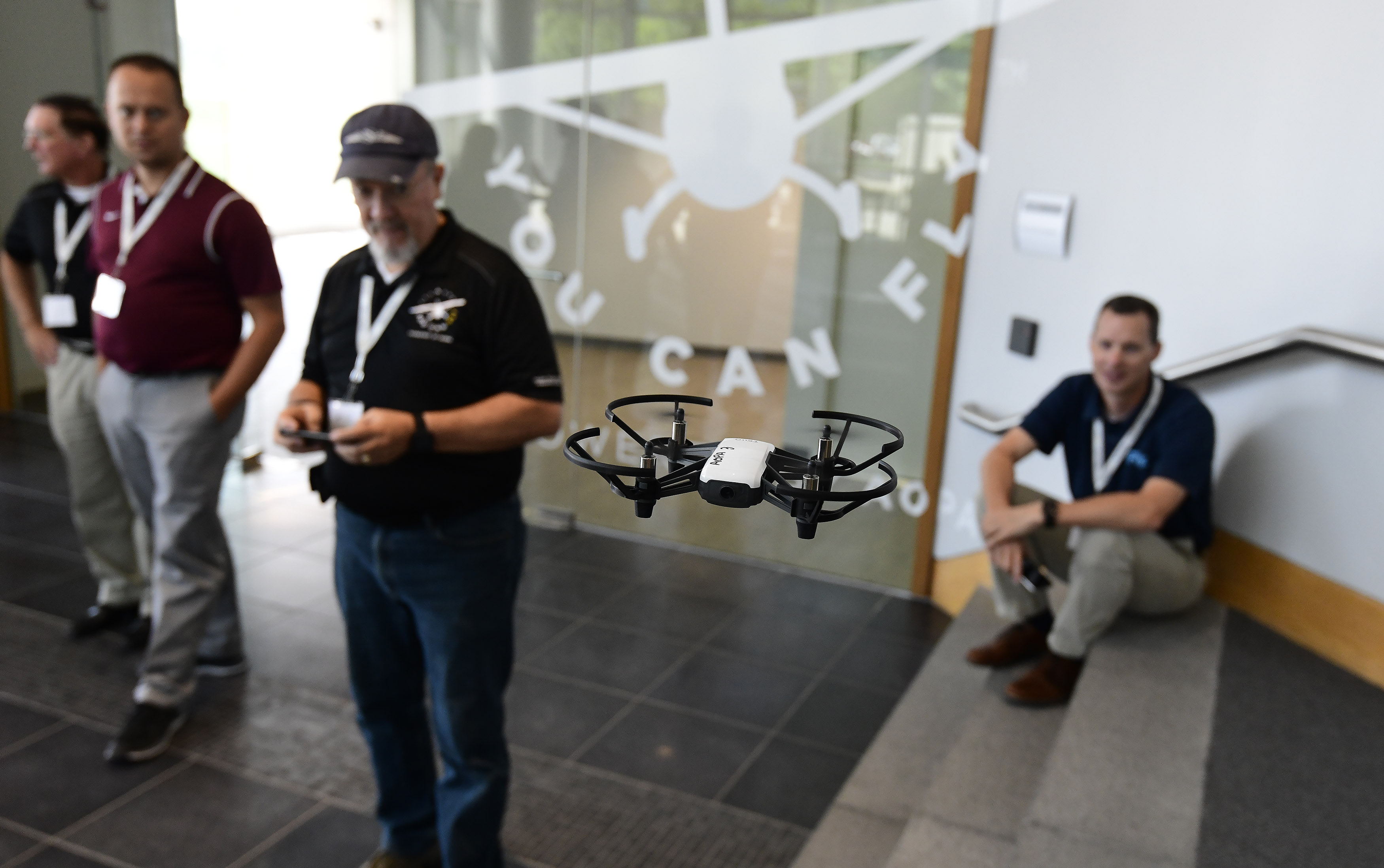 High school teachers use hands-on time piloting drones to experience the AOPA You Can Fly tenth-grade aviation curriculum that teaches science, technology, engineering, and math in a fun and engaging manner. Photo by David Tulis.
