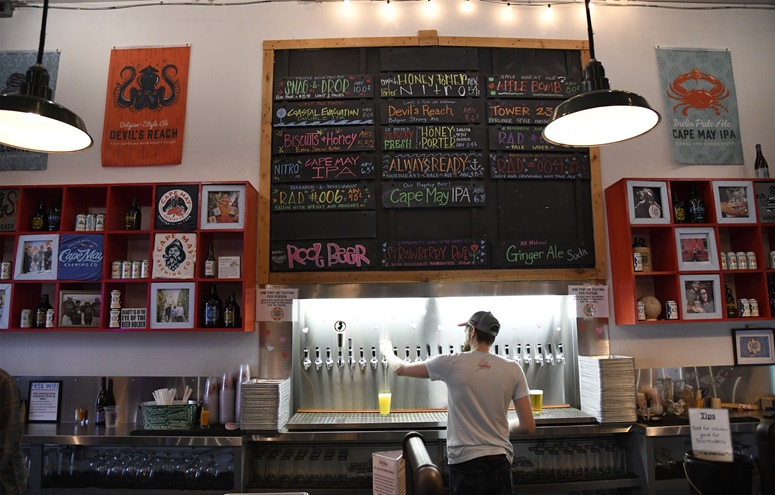 A selection of award-winning beers awaits customers visiting the Cape May Brewing Co. at the Cape May County Airport near the New Jersey shore. Photo by David Tulis.                                                                                                                        