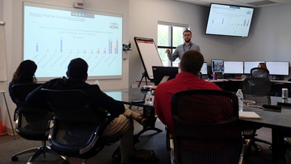 Rune Duke, AOPA senior director of airspace, air traffic, and aviation security, presents at the Aviation Weather Center Testbed. Photo courtesy of AWC.