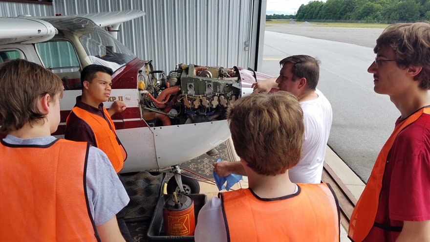 In addition to learning about piloting aircraft, students learn about the mechanics and maintenance of aircraft. Photo by Les Singleton.