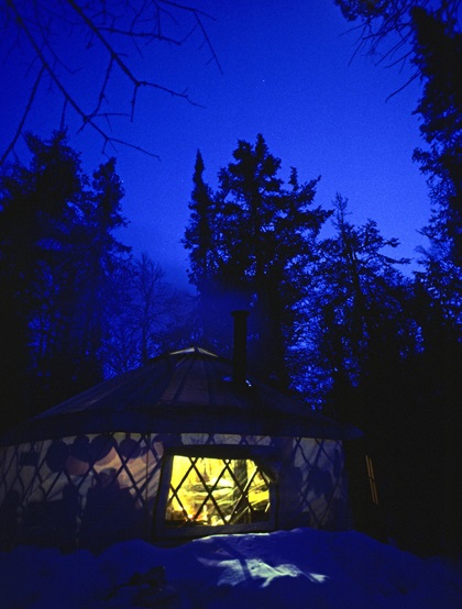 Extend your winter adventures of cross-country skiing, snowmobiling, and dog-sledding by staying at a remote wilderness yurt in Grand Marais, Minnesota. Photo courtesy of Explore Minnesota.