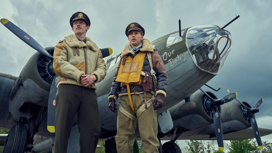 From left, Callum Turner (Maj. John Egan) and Austin Butler (Maj. Gale Cleven) in front of a B-17 Flying Fortress. Image courtesy of Apple TV.
