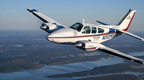 This Beechcraft Baron running both avgas and G100UL will build a few more hours over the National Mall on May 11, with further analysis to follow. Photo by David Tulis.