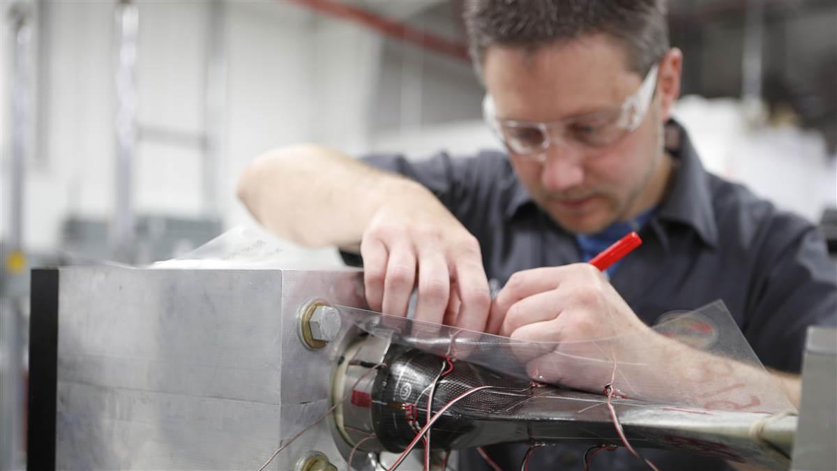 Eric Hubbard examines results from a blade stress test. 