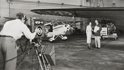 AOPA has a tradition of giving away airplanes in member contests and sweepstakes. The first such prizes were in 1956, when a Champion Sky-Trac was awarded to Donald G. Rhodes of Midvale, Utah, and a Piper Tri-Pacer was awarded to William J. Meehan of Elon College, North Carolina. The lucky winners received the keys from “Doc” Hartranft (below, on right) at Washington National Airport while on the air for the Arthur Godfrey Show; Godfrey, an AOPA charter member, acted as master of ceremonies from New York. AOPA’s latest sweepstakes, a Piper Super Cub (see 'Sweepstakes: Float-Tastic'), continues a new tradition of refurbishing legacy classics for a sweepstakes, which began in 1993.