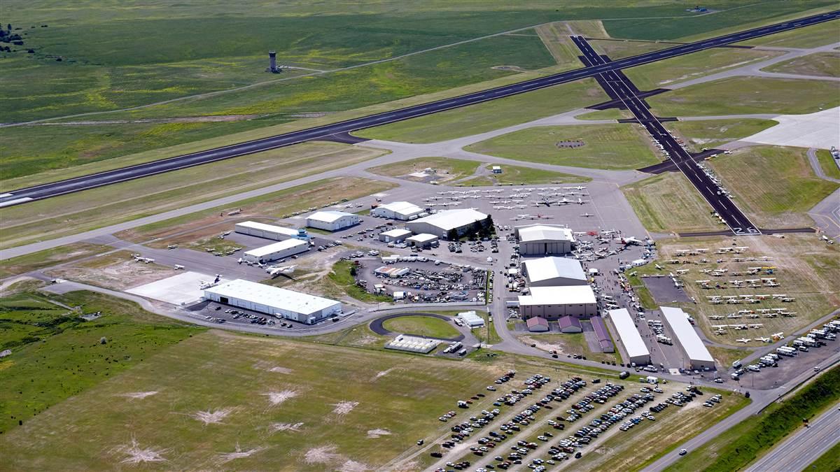 Scott Musser, Regional Sales Director, flying an Aviat Husky for aerial photography of the 2018 AOPA Fly In at Missoula.Missoula Airport (MSO)Missoula, MT