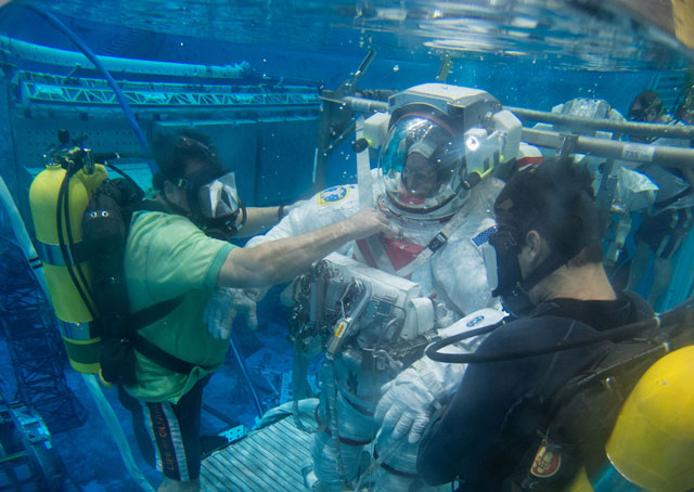 NASA astronaut Barry Wilmore trains for spacewalks in the Neutral Buoyancy Lab at the agency's Johnson Space Center in Houston. NASA photo.