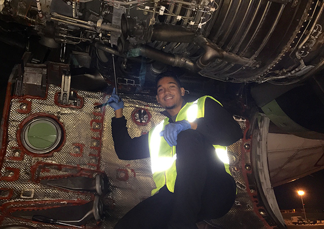 San Diego Miramar College airframe and powerplant student Tevin Nixon landed an internship with Delta Airlines in San Diego, California. Nixon is assisting with mainentance on a Delta Airlines jet. Photo courtesy of Lonny Bosselman.
