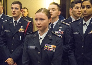 The Civil Air Patrol kicked off its seventy-fifth anniversary celebration with a reception where volunteers shared cake and accolades with many members displaying their blue dress uniforms, insignias, and awards. Photo by David Tulis.