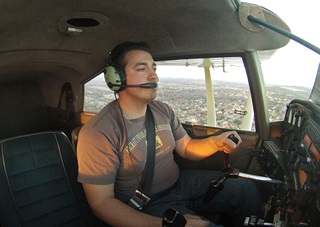 Collin McDonald pilots his family's Maule MX7-160 above the Tennessee countryside.