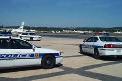 Photo of Police cars on runway