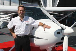 Remos Aircraft CEO Corvin Huber with the Remos GX light sport aircraft.