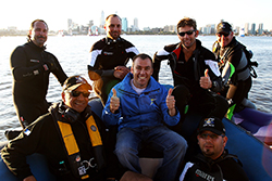 Adilson Kindlemann of Brazil meets some of the rescue team after his accident the previous day during the Red Bull Air Race Training Day Two on April 16, 2010 in Perth, Australia. Photo: Vladimir Rys / Getty Images for Red Bull Air Race