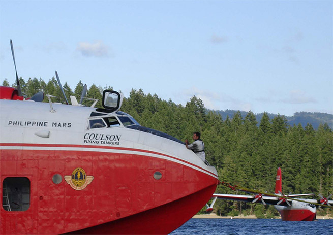 The Philippine Mars at anchor, with the Hawaii Mars in the distance. Photo courtesy of Coulson Flying Tankers.