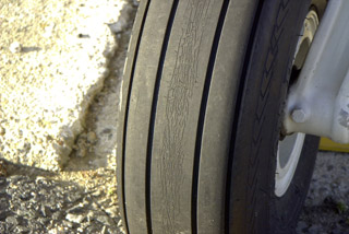 Weather-checked tire