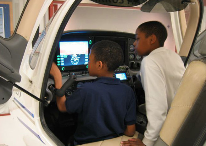 Children learning at Seattle’s Museum of Flight. Photo courtesy of Seattle’s Museum of Flight.