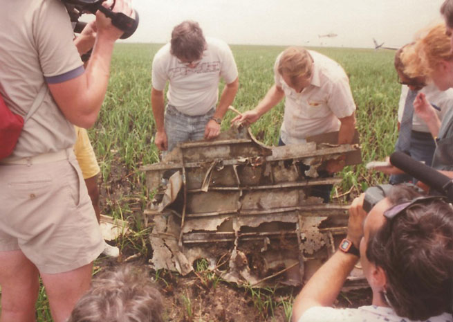 A search team including Jon F. Myhre examines wreckage found in the Florida Everglades in 1989. At the time, Myhre and others discounted the possibility this was the lead ship of Flight 19. Photo courtesy of Naval Air Station Fort Lauderdale Museum.