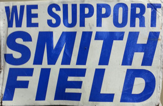 Signs supporting Smith Field Airport dotted yards in Fort Wayne, Ind., in 2002 when the community came together to save the field.