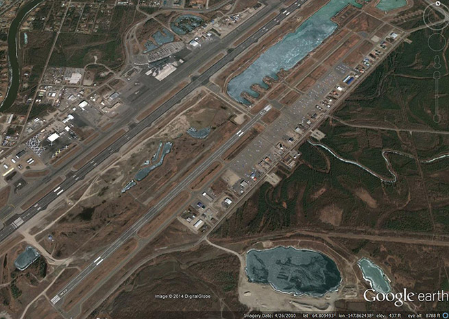 General aviation is located on the east side of Fairbanks Airport, to the right of the runways in this Google Earth image.
