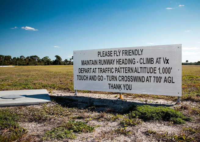 Noise reduction signs were installed by the Venice Aviation Society Inc. (VASI) in 2009. The “Always Fly Friendly” signs verbally and graphically depict noise-reduction flight procedures at the departure ends of each of the airport’s two 5,000-foot runways.