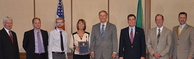 Northwest Mountain Regional Manager David Ulane, far right, was among many aviation organization members who met with Washington Gov. Jay Inslee (center) on July 1.