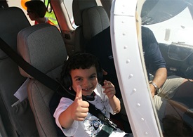 Hundreds of children have been given a taste of freedom and learned the joy of flight in GA aircraft. Photo courtesy of Challenge Air.