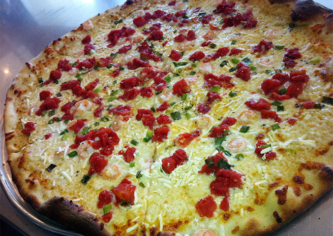 Sweet Tomatoes Pizza Truck serves up Neopolitan pies, with a crunchy crust, chunky sauce and a choice of toppings. Photo courtesy of Sweet Tomatoes. 