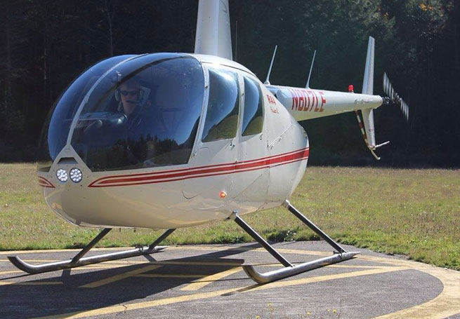 2013 Richard Santori Memorial Scholarship winner Keaton Meltvedt-Snow inside his training helicopter.