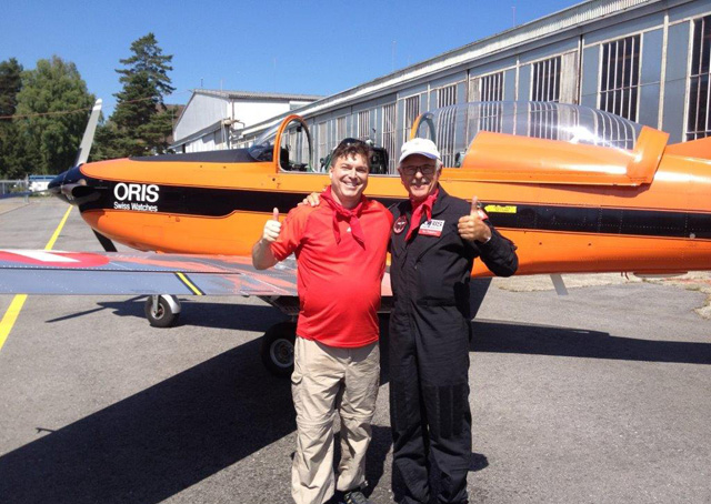 AOPA member Russ Sanders is all smiles with the Pilatus PC-7, a one-of-a-kind experience he won through the AOPA Foundation’s online auction.