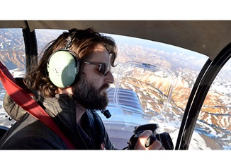 Haukur Snorrason has mastered steering with his knees to free his hands for a photo. 