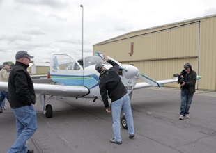 Steve Lagergren inspects his new airplane.