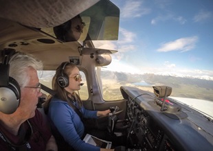 Peak Aviation Center Assistant Chief Flight Instructor Jim Van Namee leads the author on an orientation mountain flying lesson.