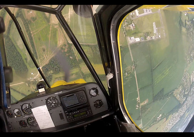 A helmet-mounted camera is a useful tool for an aerobatic pilot, allowing a post-flight review. This image was captured on the downline from a spin during the Kathy Jaffe Challenge in Lumberton, New Jersey. 