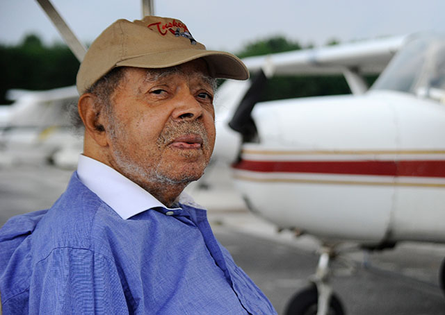 World War II Tuskegee Airman Lt. Floyd Collins, who trained in Mustang P-51 airplanes at South Dakota's Rapid City Army Air Base, visits the Montgomery County Airpark. Photo by David Tulis/AOPA.