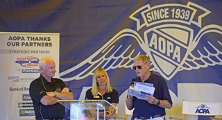 Sen. Jim Inhofe speaks about the Pilot's Bill of Rights 2 during a Pilot Town Hall with AOPA President Mark Baker at EAA AirVenture. Photo by David Tulis.