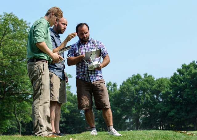 From left, intern Mike Alberding and fly4.me co-founders Adam Kersnowski and Dmitry Sharshunskiy. Photo by Michael Casey, courtesy of fly4.me.