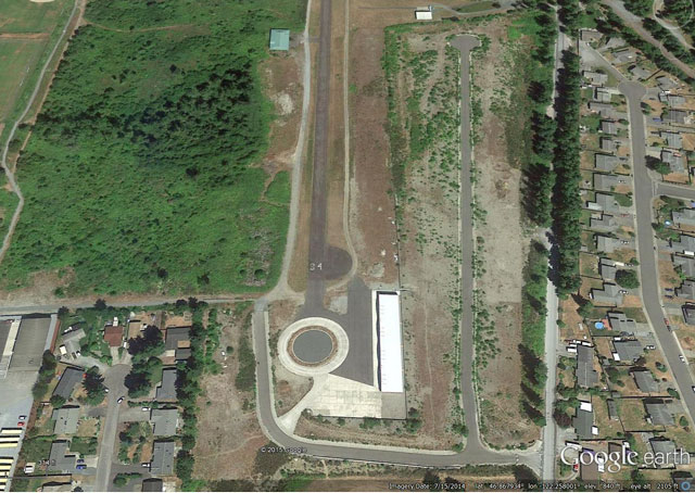 This Google Earth view shows the proposed location of the Aviator Heights development, with homes to be built around an existing cul-de-sac just east of Runway 34 (right side of image).