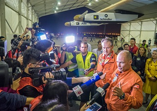 André Borschberg and Bertrand Piccard address a crowd of media at Chongqing Jiangbei International Airport, China on March 31. Photo courtesy of Solar Impulse.