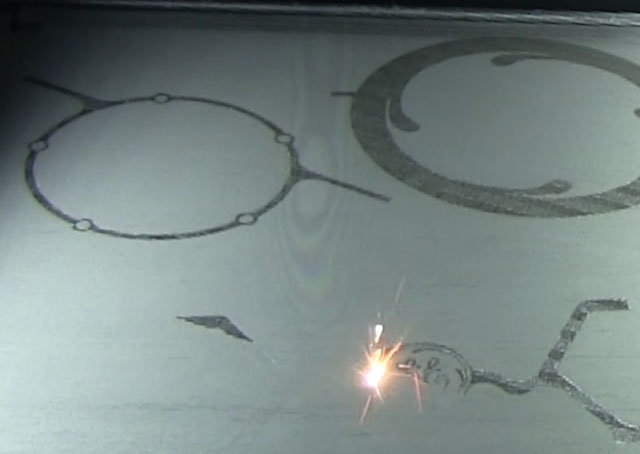 The laser melts metal powder into high-strength alloys. Image courtesy of GE Reports.
