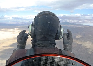 Dayton Dabbs flies over the Rocky Mountains in Arizona.
