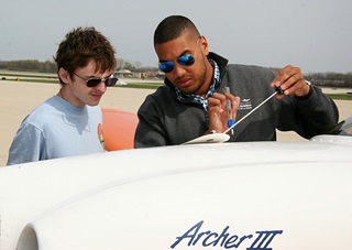 A Parkland College student and instructor preflight a Piper Archer III at the school's Champaign, Illinois, flight training facility. Photo courtesy of Parkland College.