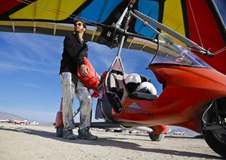 "I can't think of any other gift that I can give here that's more memorable or more personal," said trike pilot Jake McGuire, who embraces one of the festival's 10 core principals. Photo by Chris Rose/AOPA