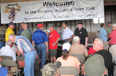 AOPA President Craig Fuller mingled with the audience after the speakers panel.